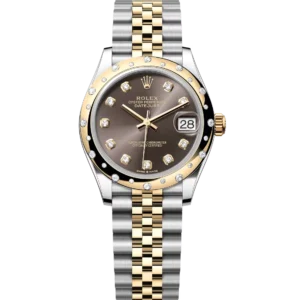 This Oyster Perpetual Datejust 31 in Oystersteel and yellow gold features a dark grey, diamond-set dial and a Jubilee band.