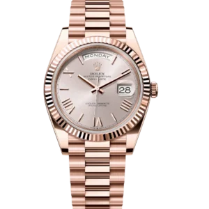 Rolex Day-Date 40 Oyster Perpetual 18 ct Everose gold Sundust dial fluted bezel President band Reference 228235